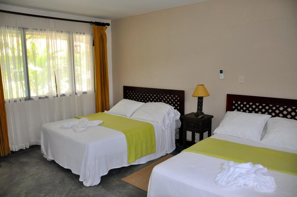 Hotel Hacienda Del Mar Puerto Carrillo Ruang foto